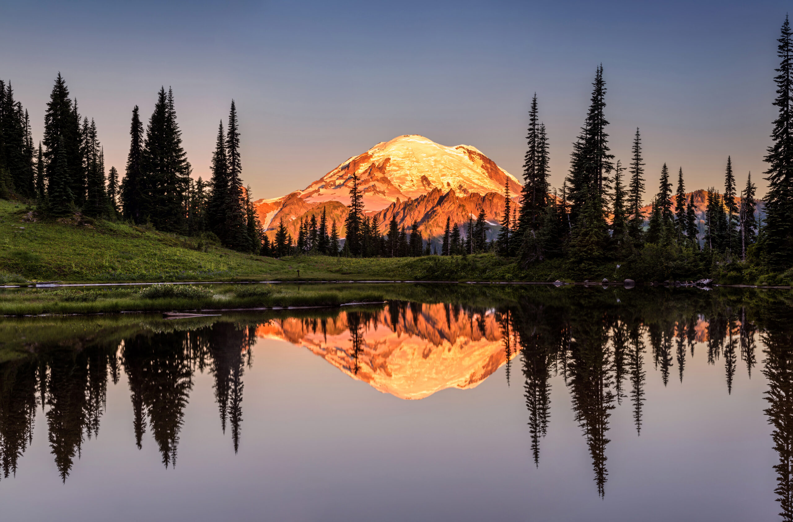 Mountain reflected on still water